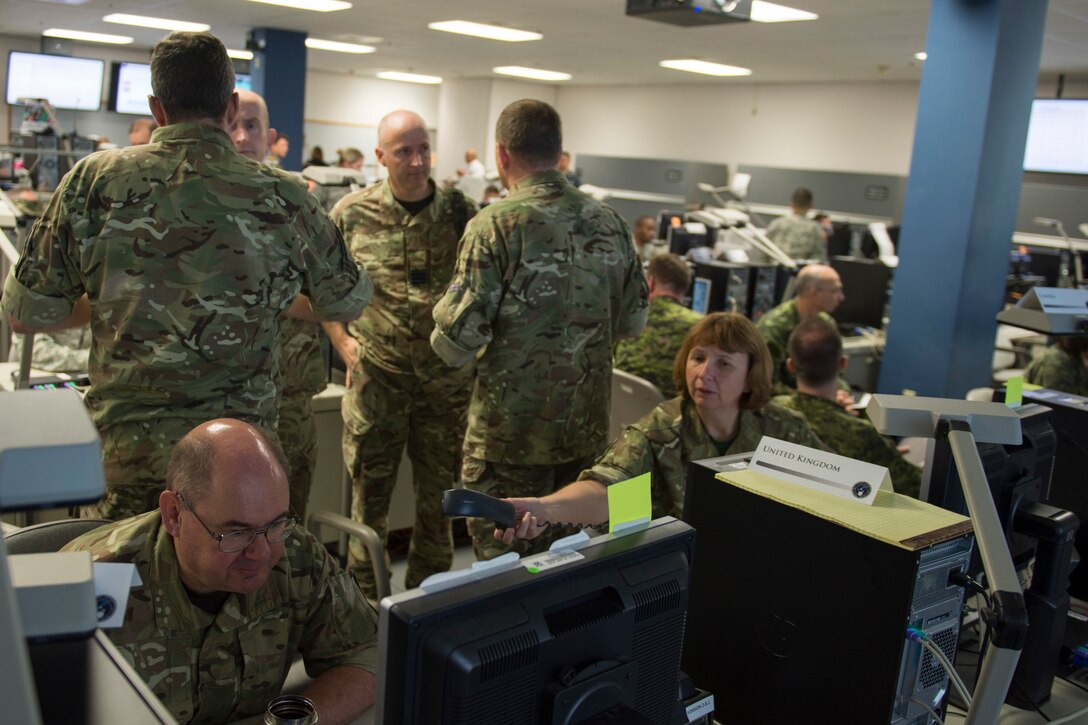 Participants at the Cyber Guard 2016 exercise work through a June 16. 2016, training scenario during the nine-day exercise in Suffolk, Va., that concluded last week. Air Force Lt. Gen. James K. “Kevin” McLaughlin, the deputy commander of U.S. Cyber Command, told the House Armed Services Committee June 22 that the exercise is critical to training cyber warriors to operate in the new domain. DoD photo by Navy Petty Officer 2nd Class Jesse A. Hyatt