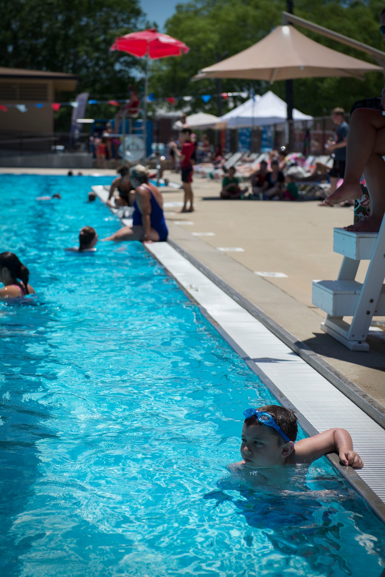 The grand opening for the Scott Air Force Base pool took place June 17. The historic bathhouse facility underwent a facelift that included all-new flooring, stainless steel fixtures, energy efficient pumps, handicap accessible bathroom stalls and ramps, and slide upgrades.