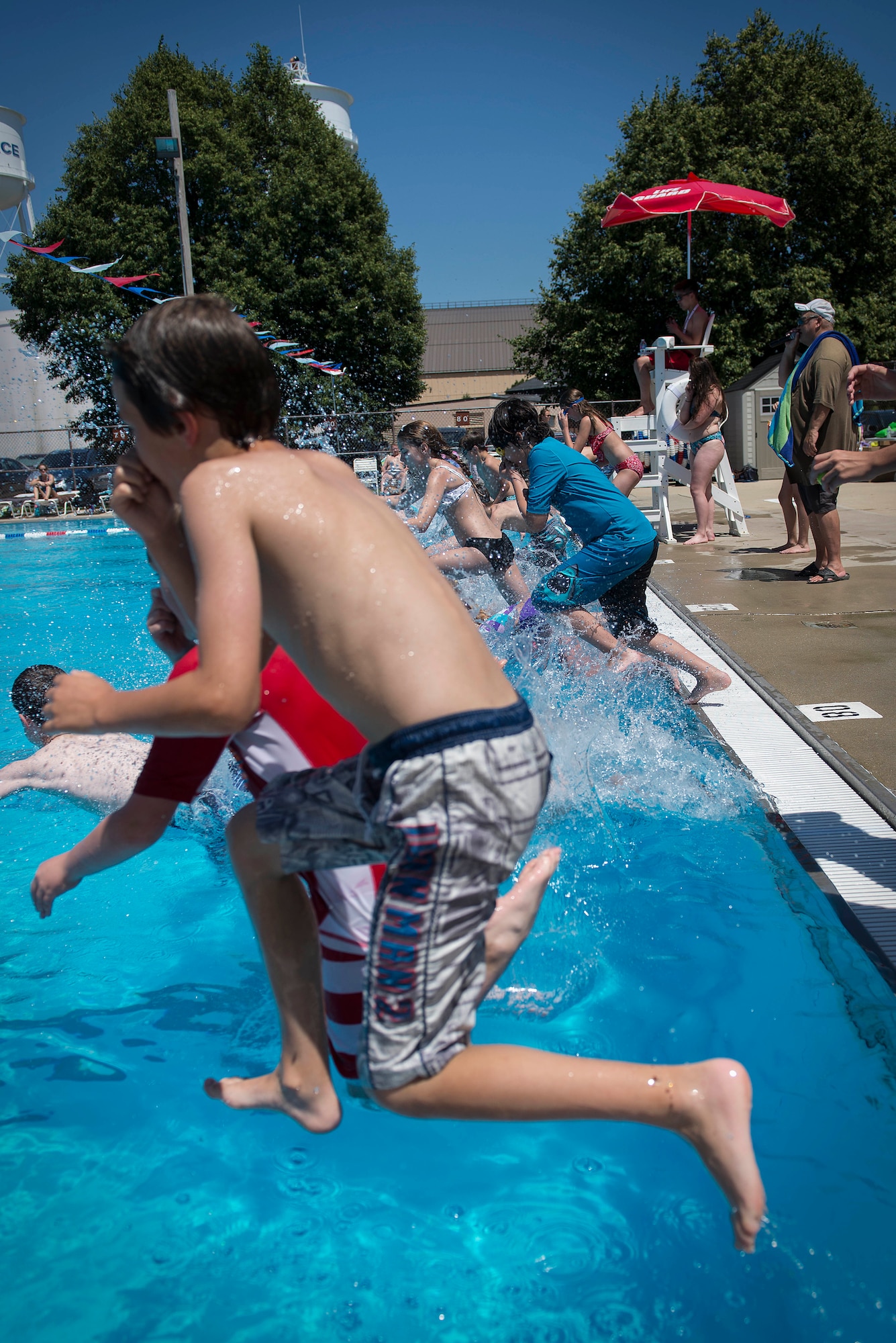 The grand opening for the Scott Air Force Base pool took place June 17. The historic bathhouse facility underwent a facelift that included all-new flooring, stainless steel fixtures, energy efficient pumps, handicap accessible bathroom stalls and ramps, and slide upgrades. (U.S. Air Force photo/Senior Airman Jake Eckhardt)