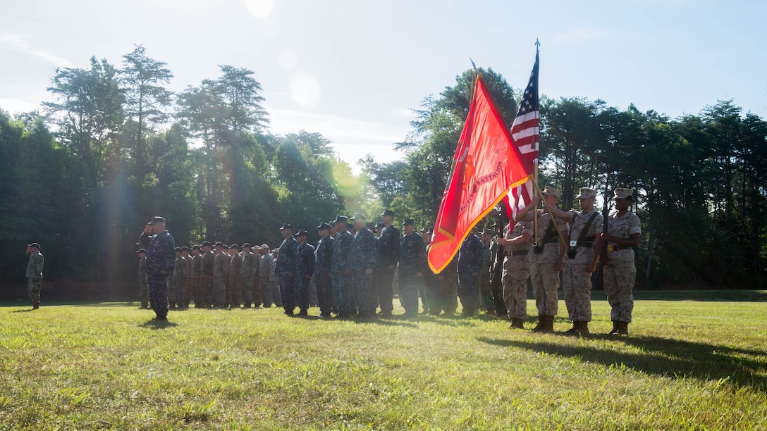 Members of the Marine Corps Base Quantico ceremonial platoon present the colors during the opening ceremony for the 55th annual Interservice Rifle Championship at Range 4, Weapons Training Battalion, Marine Corps Base Quantico, Viriginia, June 22, 2016. The competition was recognized and endorsed in 1960 and has participants from all branches of the military. 