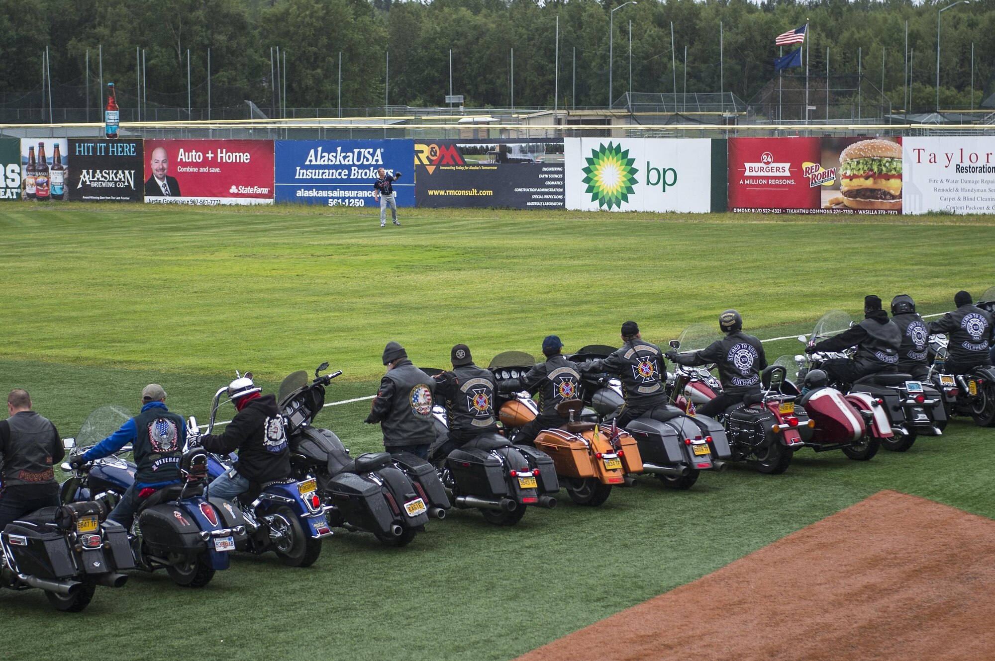 Members of the Alaska Vets Motorcycle Club get ready to depart Mulchay Stadium after the pregame ceremony for the Anchorage Bucs Military Appreciation Game in Anchorage, Alaska, June 19, 2016. (U.S. Air Force photo by Senior Airman James Richardson/Released)