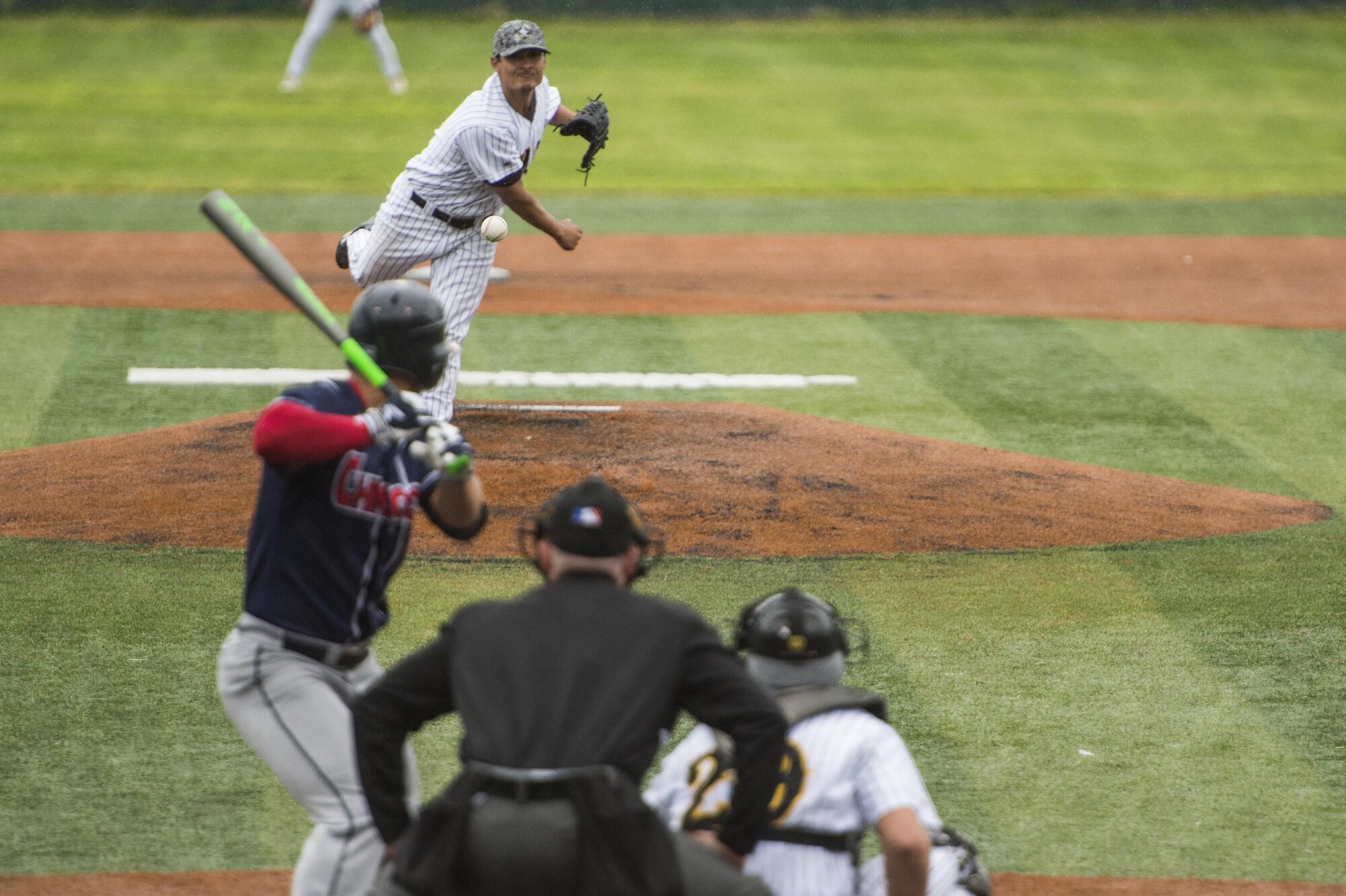 Anchorage Bucs pitcher Angel Landazuri, pitches during the Anchorage Bucs Military Appreciation Game at Mulcahy Stadium in Anchorage, Alaska, June 19, 2016.  (U.S. Air Force photo by Senior Airman James Richardson/Released)