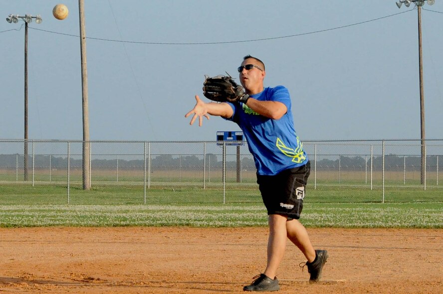 David Anderson, from Air Force Global Strike Command softball team, pitches in the top of the fourth inning at Barksdale Air Force Base, La., June 19, 2016. AFGSC beat the 2nd Security Forces Squadron 16-9. (U.S. Air Force photo/Airman First Class Stuart Bright)