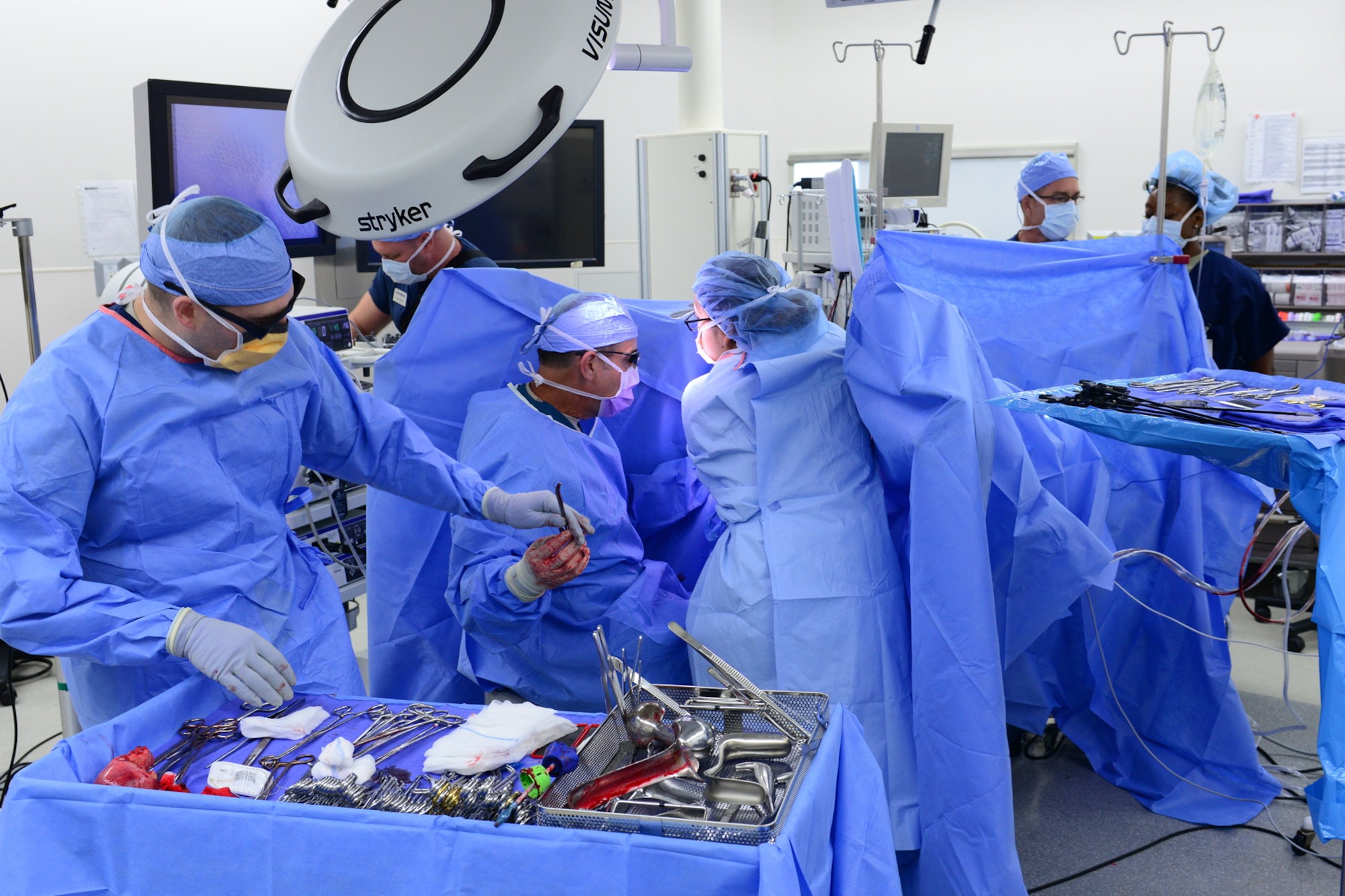 U.S. Air Force Airmen assigned to the 633rd Medical Operations Squadron finish a surgery at Langley Air Force Base, Va., June 14, 2016. The surgery was conducted using a new 3-D camera laparoscopically, which allows surgeons to increase accuracy and precision during procedures. (U.S. Air Force photo by Staff Sgt. Ciara Gosier)