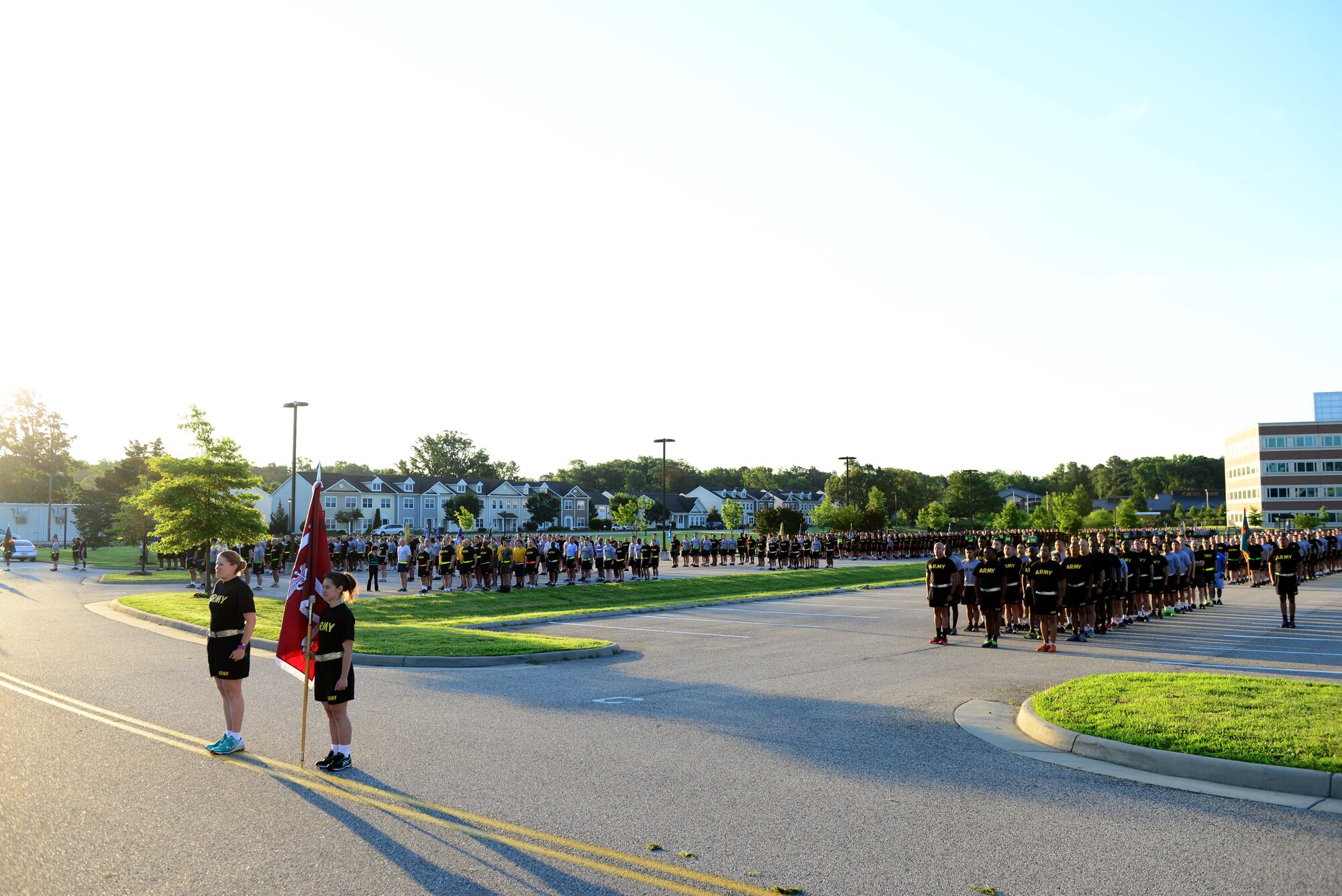 U.S. Service members stand in formation before starting the Army Birthday run at Fort Eustis, Va., June 14, 2016. The units remained in formation for the entirety of the run to promote camaraderie. (U.S. Air Force photo by Staff Sgt. J.D. Strong III)