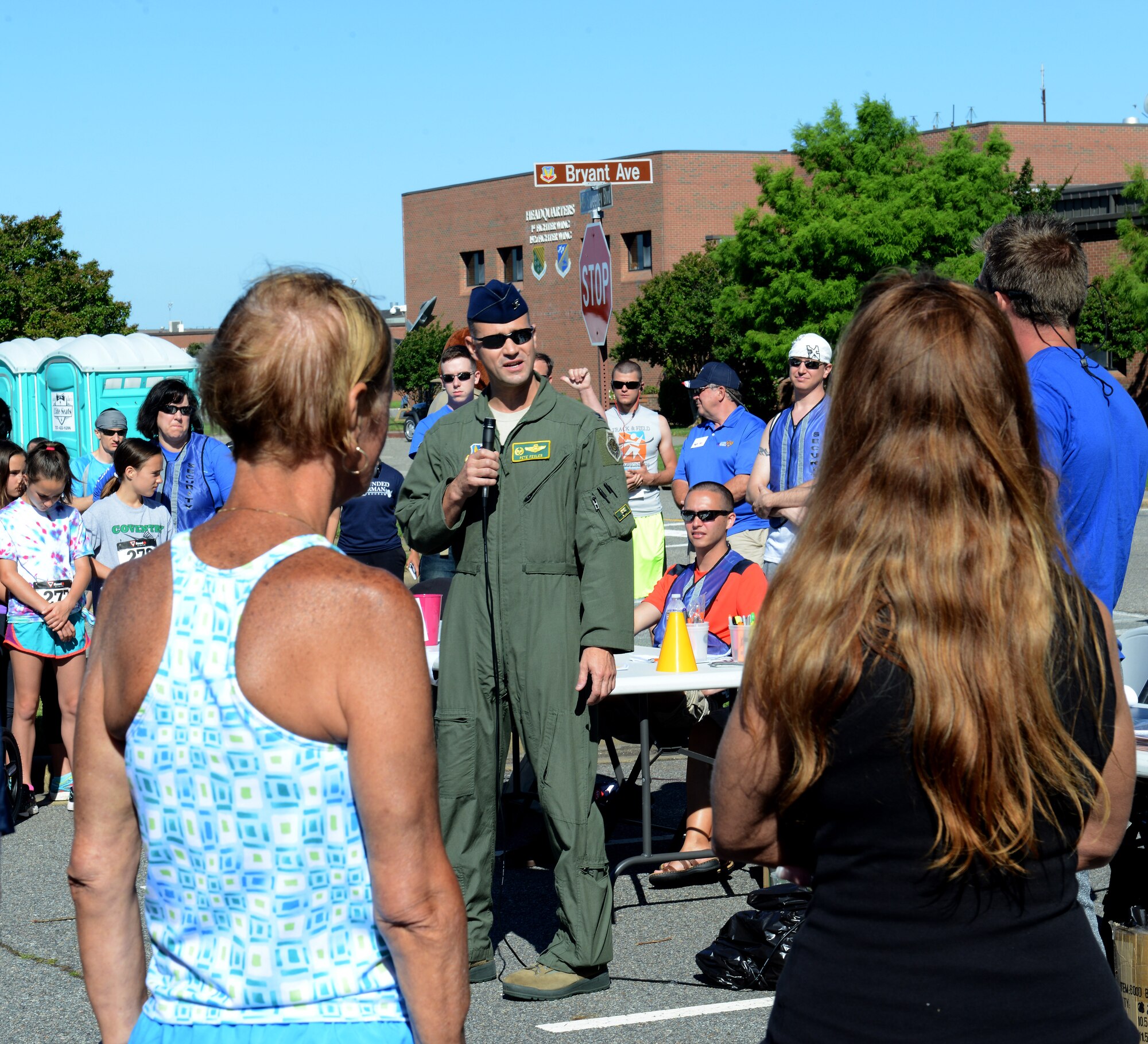 U.S. Air Force Col. Pete Fesler, 1st Fighter Wing commander, welcomes participants to the Langley Chapter Air Force Association Wounded Airman Program 5K at Langley Air Force Base, Va., June 18, 2016. The event included a one-mile kids run, a play area, awards and a raffle. (U.S. Air Force photo by Staff Sgt. Teresa J. Cleveland)