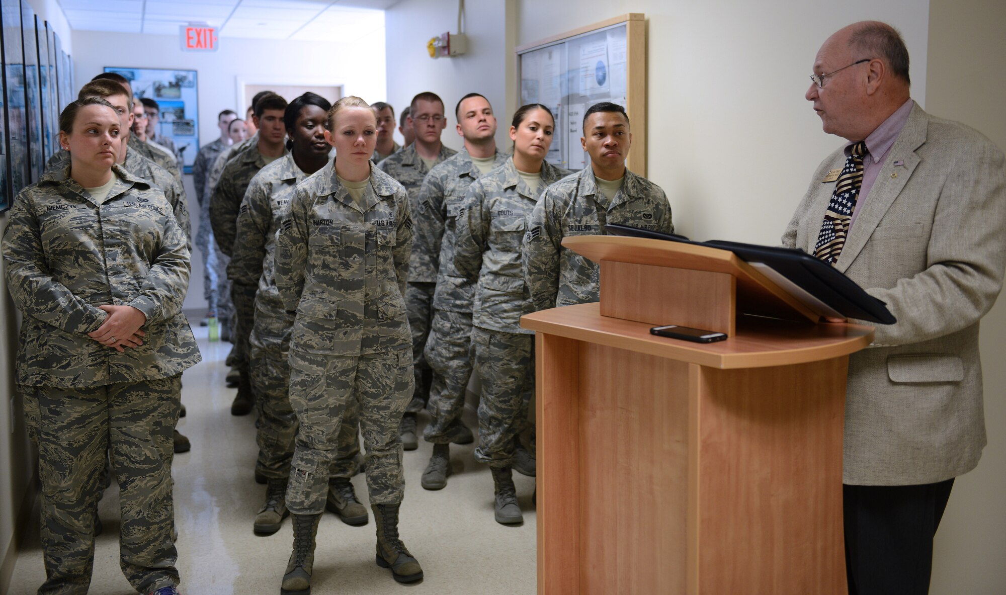 William Trimble, National Exchange Club Region 11 vice president, speaks to Airman Leadership School students during a ceremony at Langley Air Force Base, Virginia, June 14. The NEC dedicated a Freedom Shrine to the Professional Development Center to include replicas of the Declaration of Independence, the Constitution of the United States and the Gettysburg Address. (U.S. Air Force photo by Staff Sgt. Teresa J. Cleveland)