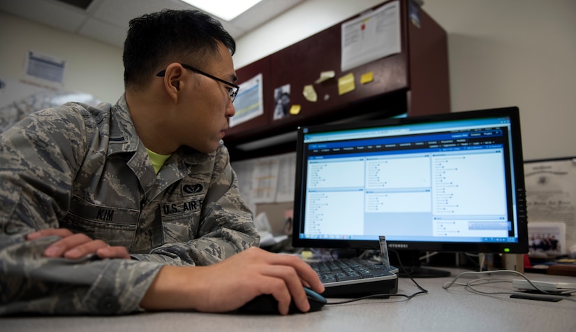 1st Lt Timothy Kim, 11th Civil Engineer Squadron installation Tririga information owner, poses for a photo while working with the next generation of information technology system, Tririga, inside the 11th CES headquarters building at Joint Base Andrews, Md., June 9, 2016. JBA’s 11th CES is the first unit to implement Tririga the system in the U.S. Air Force. (U.S. Air Force photo by Airman 1st Class Philip Bryant)