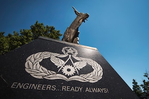 The 11th Civil Engineer Squadron statue sits outside the 11th CES headquarters building at Joint Base Andrews, Md., June 9, 2016. The Prime Base Engineer Emergency Force Bull, or Prime BEEF, is synonymous with U.S. Air Force Civil Engineers around the world. JBA’s 11th CES is the first unit to implement Tririga, the next generation of information technology system in the U.S. Air Force. (U.S. Air Force photo by Airman 1st Class Philip Bryant)
