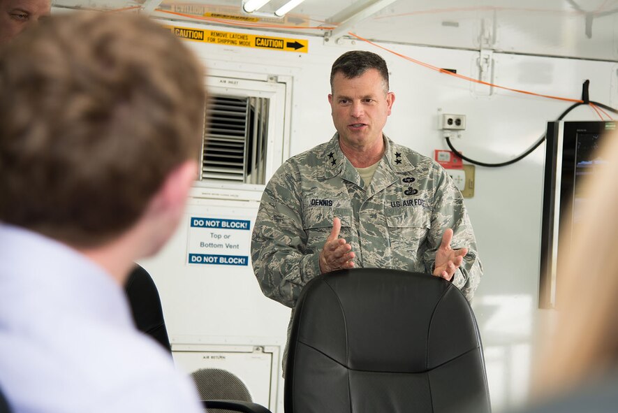 Maj. Gen. Dwyer L. Dennis, Command, Control, Communications, Intelligence and Networks program executive officer, recently shared some of his focus areas for this new role, including highlighting the importance of the workforce. In the photo above, Dennis
speaks to members of Hanscom Air Force Base's junior workforce during a kickoff meeting for the Air Force Research Laboratory Commander's Challenge at the base June 9.  (U.S. Air Force photo by Mark Herlihy)  