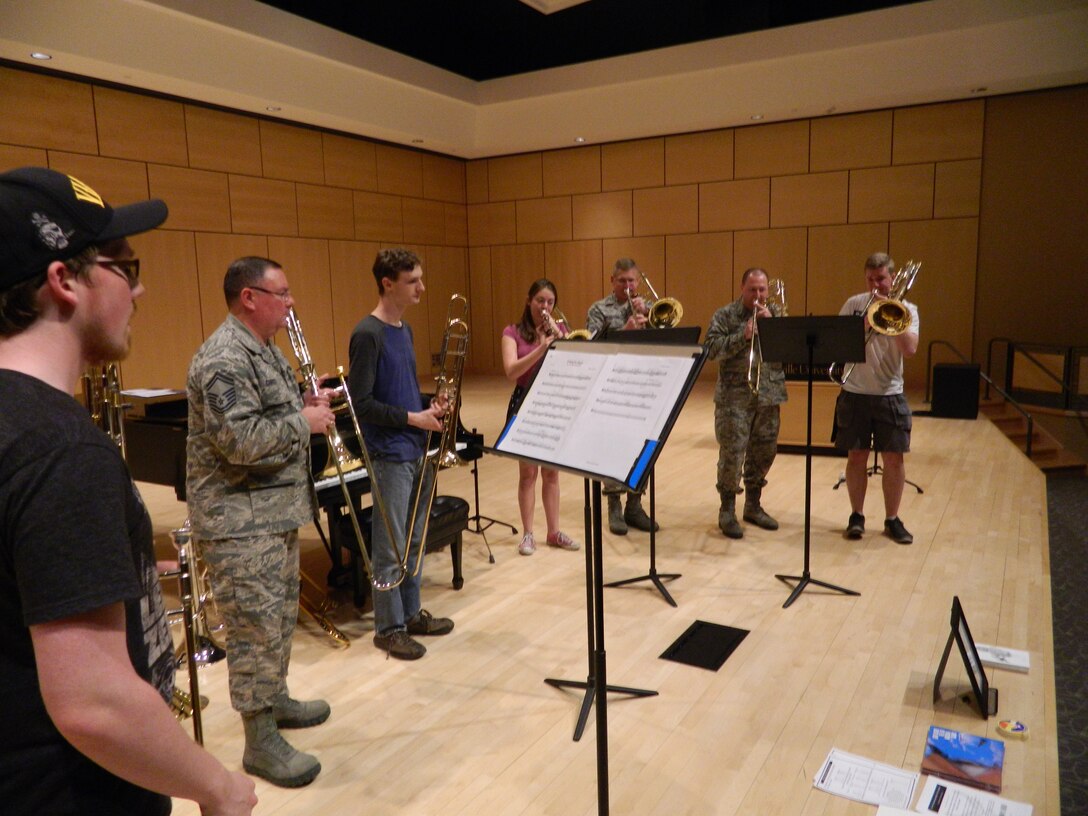 Members of the Spectre Bones Trombone Quartet join students at Millersville University, Millersville Pennsylvania for a trombone Master Class on April 18, 2016.  Spectre Bones members pictured are Senior Master Sgt. John Christ 2nd from left, Senior Master Sgt. Donald Naumann 5th from left, Master Sgt. Joshua Fickes 6th from left.
(Courtesy Photo)