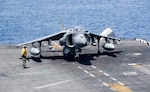 An AV-8B Harrier II, assigned to the 13th Marine Expeditionary Unit (MEU), prepares to launch from the amphibious assault ship USS Boxer (LHD 4) to conduct missions in support of Operation Inherent Resolve.