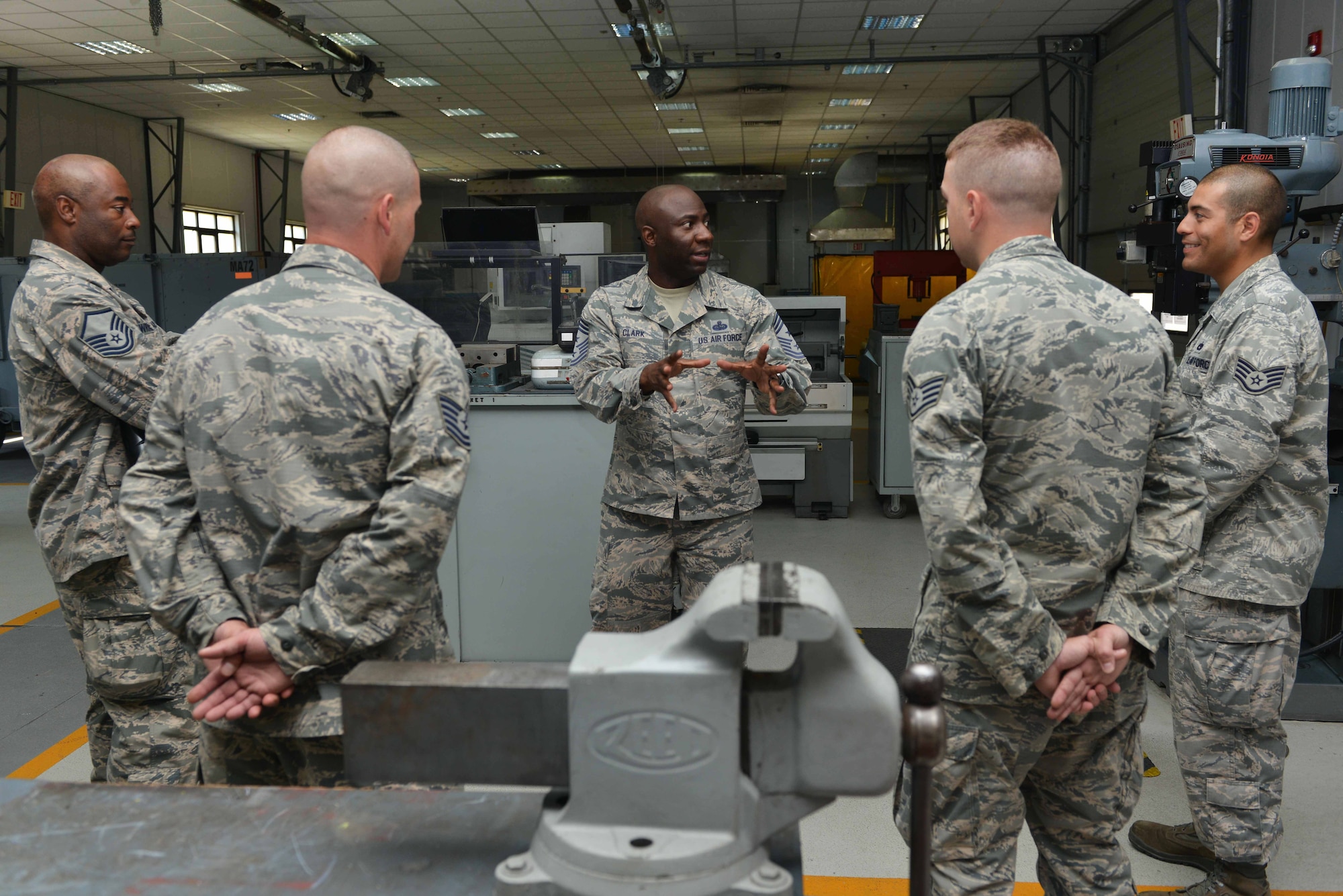 U.S. Air Force Chief Master Sgt. Vegas Clark, 39th Air Base Wing command chief, speaks to 39th Maintenance Squadron Airmen June 22, 2016, at Incirlik Air Base, Turkey. Clark visited the 39th MXS to learn more about their daily operations and tasks. (U.S. Air Force photo by Senior Airman John Nieves Camacho/Released)