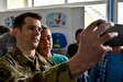 Maj. Christopher O’Brien, assigned to Company A, 457th Civil Affairs Battalion, takes a selfie photo with a Bosnia and Herzegovina student during a school visit May 24, 2016. The CA team was following up and assessing the three-year-old renovation of the school that was accomplished by a partnership between the U.S. and the people of Bosnia and Herzegovina. 