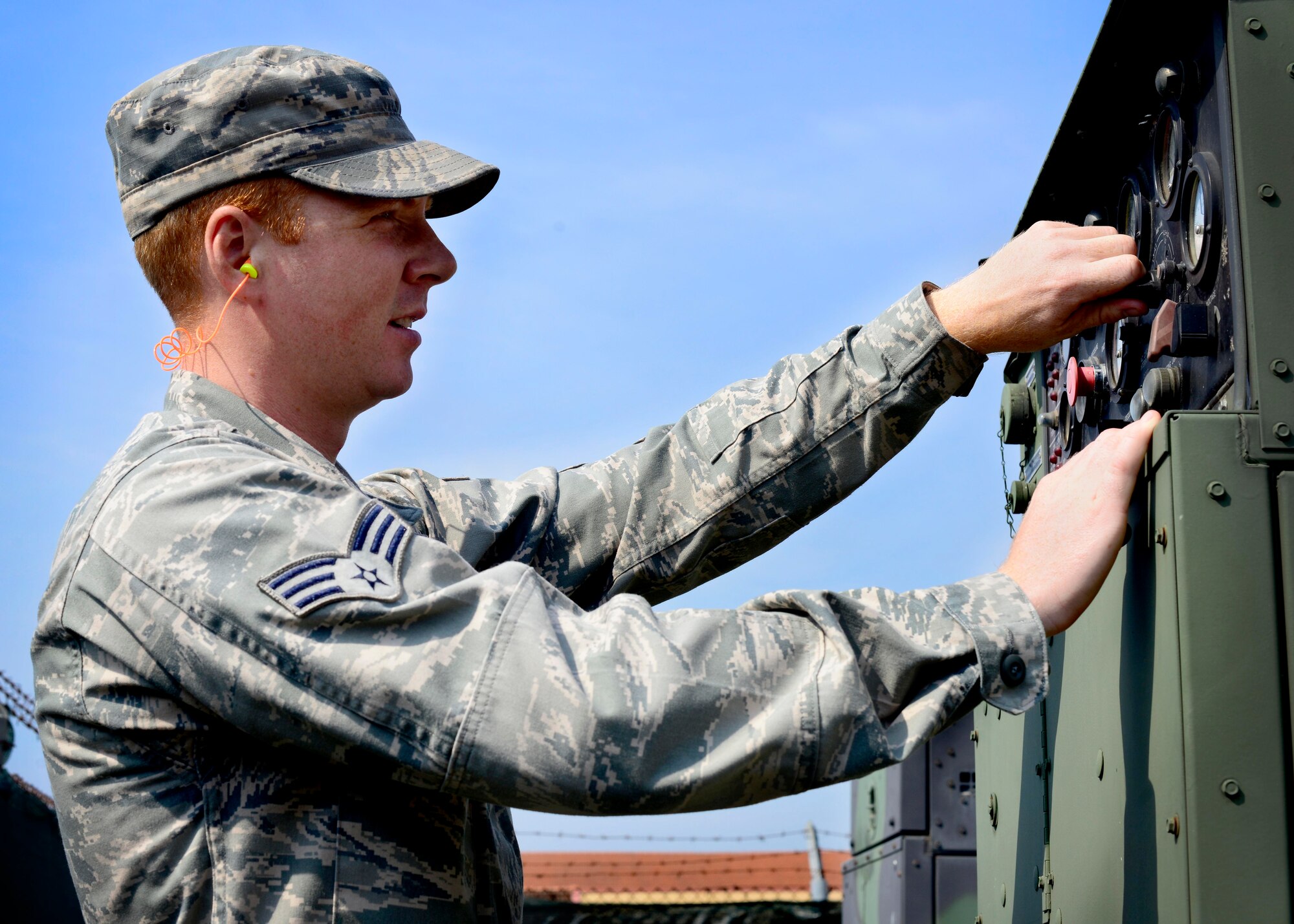 Senior Airman Robert Gulliver, 31st Civil Engineer Squadron electrical power production journeyman, performs a systems check on a mobile generator, June 21, 2016, at Aviano Air Base, Italy. Gulliver believes everyone should set a personal precedence for themselves, do their best and expect the best from others. (U.S. Air Force photo by Senior Airman Areca T. Bell/Released)