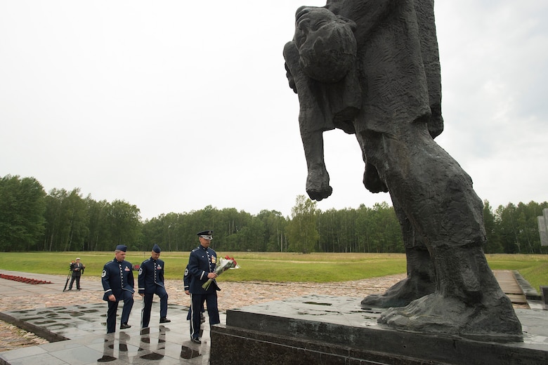 Members of the U.S. Air Forces in Europe Band bring flowers to the site of the “Unbowed Man” statue June 20, 2016, in Khatyn Memorial, Belarus. While in Belarus, 13 bandsmen performed in Minsk and surrounding communities to commemorate the alliance that ended the greatest conflict of the 20th Century. The United States, Belarus, and other ally and partner nations continue to remember and honor shared World War II sacrifices. (U.S. Air Force photo/Technical Sgt. Paul Villanueva II)