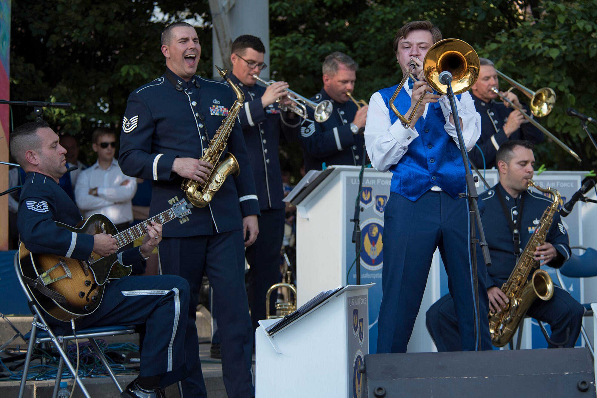 Eugeniy Belski, right, plays a trombone solo during a performance with the U.S. Air Forces in Europe Band’s Ambassadors Jazz Ensemble June 19, 2016, in Mogilev, Belarus. Airmen from the USAFE band asked Belski to join them on stage after talking with him at a meeting earlier in the day. Belski is a student at the Belarus State Academy of Music. While in Belarus, 13 bandsmen performed in Minsk and surrounding communities. (U.S. Air Force photo/Technical Sgt. Paul Villanueva II)