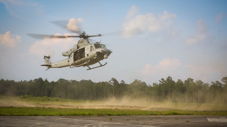 A UH-1Y Venom approaches a landing zone during a training exercise at Camp Davis near Marine Corps Base Camp Lejeune, N.C., June 17, 2016. The aircraft and its crew are assigned to Marine Light Attack Helicopter Squadron 167, 2nd Marine Aircraft Wing. Familiarization flights familiarize pilots new to the unit with the different landing zones and flight procedures around the Camp Lejeune area. 