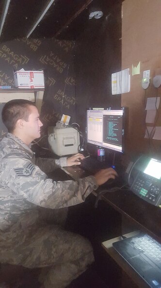 Staff Sgt. Dale Ransom performs tasks as a deployed cashier at an undisclosed location on June 22, 2016. Ransom, who is assigned to the 914th Airlift Wing in Niagara Falls, NY is responsible for many finance duties to include: cashiering, voucher preparing and entitlement processing. (Courtesy Photo)
