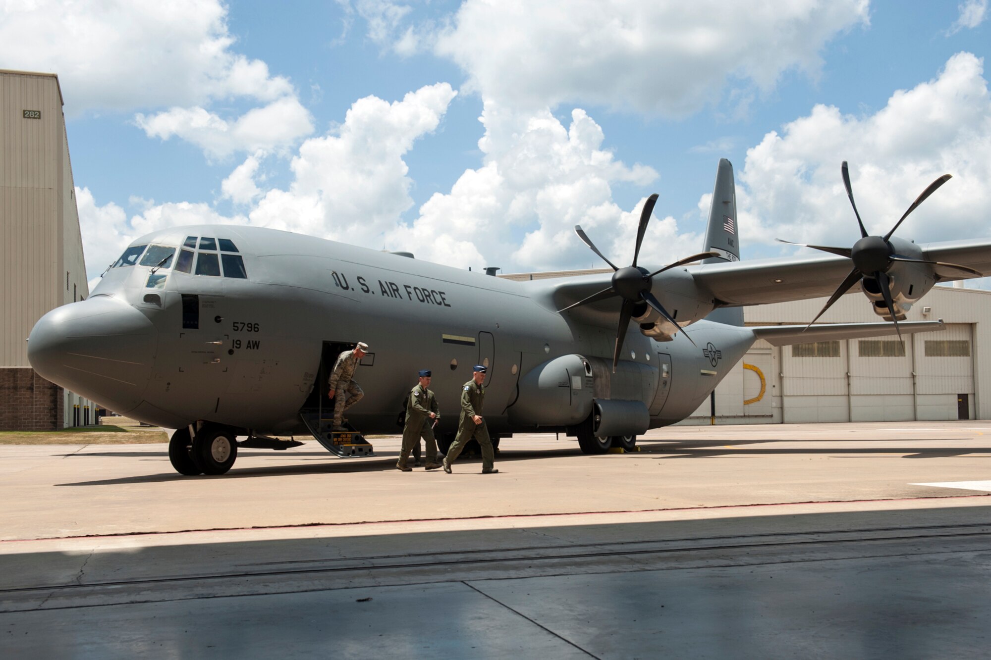 U.S. Air Force Gen. Carlton D. Everhart II, Air Mobility Command commander, departs a C-130J prior to an aircraft delivery ceremony at Little Rock Air Force Base, Ark., June 20, 2016. Everhart delivered the final C-130J to the 19th Airlift Wing form Lockheed Martin. On Jan. 1, 2016, the 913th Airlift Group, active association designation officially changed to a classic association. Airmen assigned to the 913th AG, Air Force Reserve Command, are currently providing support to the 41st Airlift Squadron and 61st Airlift Squadron and may soon be flying and providing maintenance support for this aircraft. (U.S. Air Force photo/Senior Airman Harry Brexel/Released)