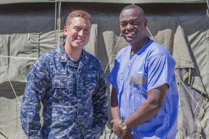 U.S. Navy Reserve Sailors, Expeditionary Medical Facility Dallas One, Fort Worth, Texas, are part of the joint service staff assisting U.S. Army Reserve Soldiers at the 325th Combat Support Hospital during Combat Support Training Exercise 91-16-02, Fort Hunter Liggett, Calif., June 18, 2016. As the largest U.S. Army Reserve training exercise, CSTX 91-16-02 provides Soldiers with unique opportunities to sharpen their technical and tactical skills in combat-like conditions. (U.S. Army photo by Spc. Fatima Konteh, 367th Mobile Public Affairs Detachment)