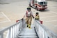 U.S. Air Force Col. Marty Reynolds, 55th Wing commander, participates in a fire rescue exercise at building 382 with firefighters assigned to the 55th Civil Engineer Squadron at Offutt Air Force Base, Neb., June 21, 2016. The exercise provided firsthand experience what tools and techniques are needed to perform the duties of an Offutt firefighter. (U.S. Air Force photo by Zachary Hada)