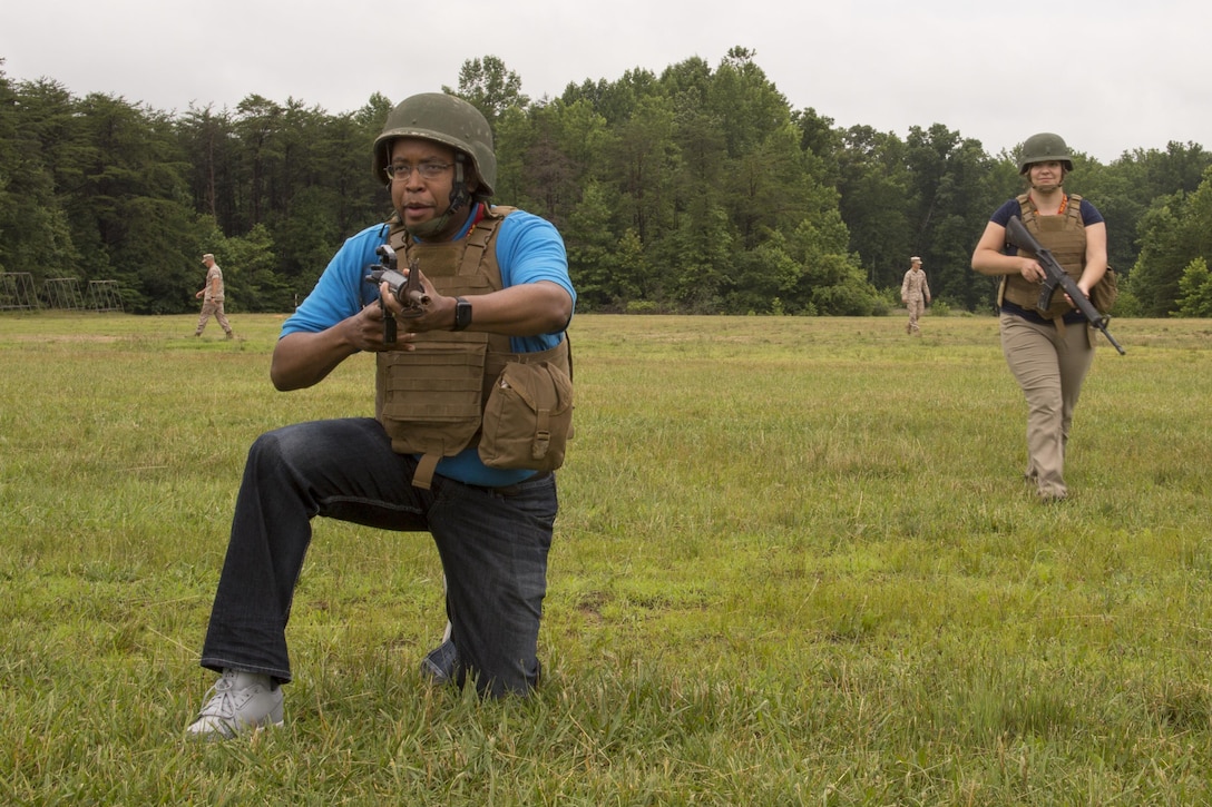 Erik Walker practices buddy rushing during the infantry patrolling portion of the 2016 Key Leaders and Educators Workshop aboard Marine Corps Base Quantico, Va., June 23. The week-long workshop creates a mutually beneficial relationship between educators and the Marine Corps where key leaders and educators can share knowledge about the Corps with America's leaders of tomorrow. Walker is the assistant dean for law career services at the University of Arkansas, Little Rock, Arkansas.