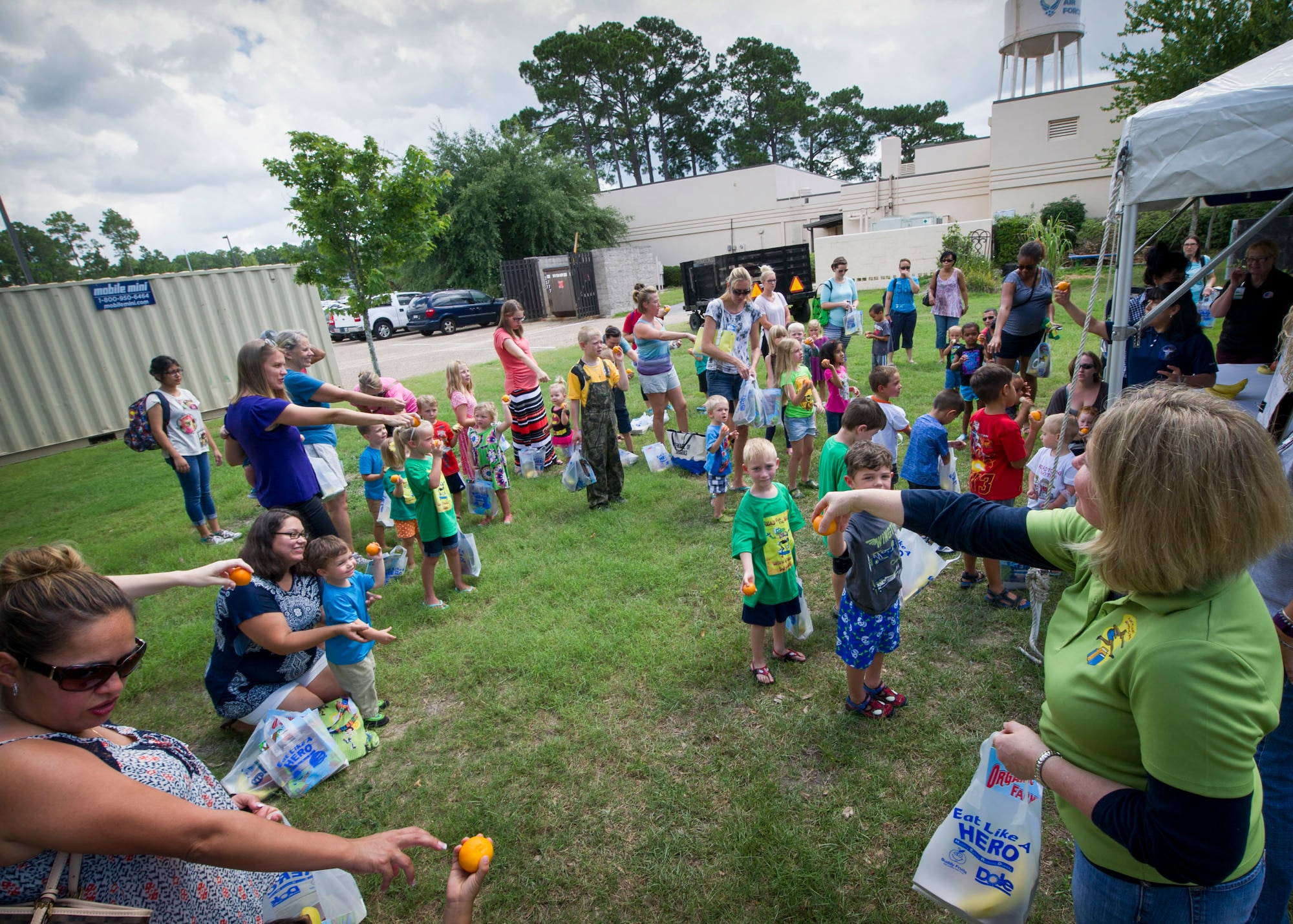 Children sing-along during a fruit and vegetable version of the ‘Hokey-Pokey’ during a Summer Reading Program event at Hurlburt Field Library, Fla., June 23, 2016. During the event, children participated in physical activities while learning the importance of fruit and vegetable intake. (U.S. Air Force photo by Senior Airman Krystal M. Garrett)