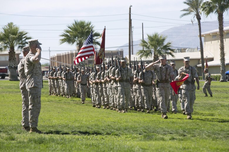 Lt. Col. Christopher Siler, on-coming commanding officer, and Lt. Col. Steven Murphy, outgoing commanding officer, Marine Wing Support Squadron 374, conduct a pass-in-review during the unit’s change of command at Lance Cpl. Torrey L. Gray Field, June 17, 2016. (Official Marine Corps photo by Cpl. Thomas Mudd/Released)