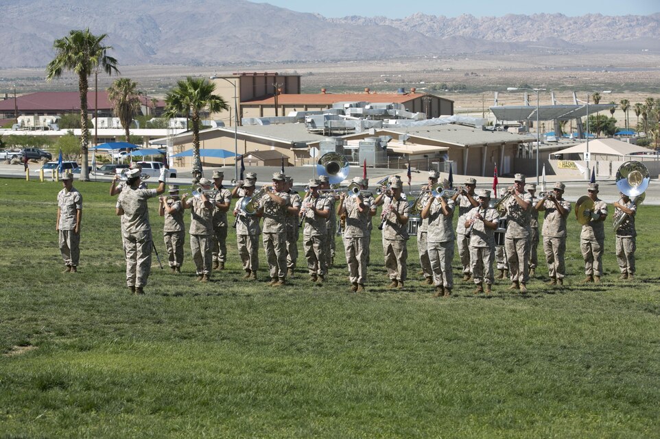 The 3rd Marine Aircraft Wing Band performs the Marines’ Hymn at the end of Marine Wing Support, Squadron 374’s change of command at Lance Cpl. Torrey L. Gray Field, June 17, 2016. (Official Marine Corps photo by Cpl. Thomas Mudd/Released)