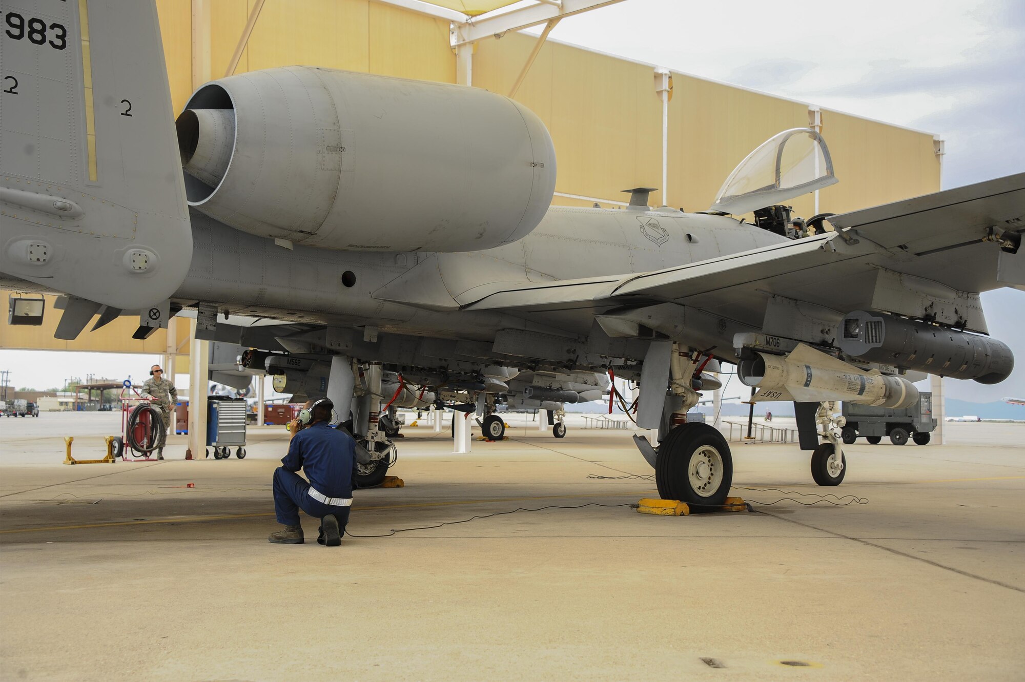 U.S. Air Force Senior Airman Andy Bui, 355th Aircraft Maintenance Squadron A-10C Thunderbolt II crew chief, prepares to perform a pre-flight checklist on the flightline at Davis-Monthan Air Force Base, Ariz., June 23, 2016. The checklists are designed to ensure the safety of the aircraft and pilot before takeoff. (U.S. Air Force photo by Airman 1st Class Mya M. Crosby/Released)