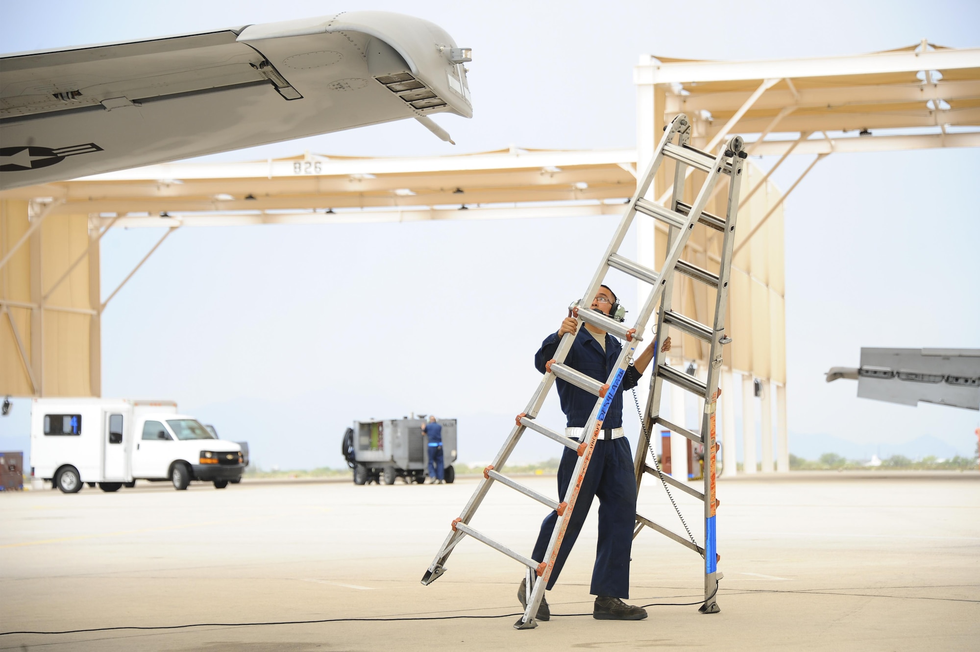 U.S. Air Force Senior Airman Andy Bui, 355th Aircraft Maintenance Squadron A-10C Thunderbolt II crew chief, prepares to perform an operational check on the flightline at Davis-Monthan Air Force Base, Ariz., June 23, 2016. The 355th AMXS generates all combat and training sorties in the 355th Fighter Wing and manages the efforts of 500 Airmen in 10 specialties maintaining A-10C attack aircraft. (U.S. Air Force photo by Airman 1st Class Mya M. Crosby/Released)