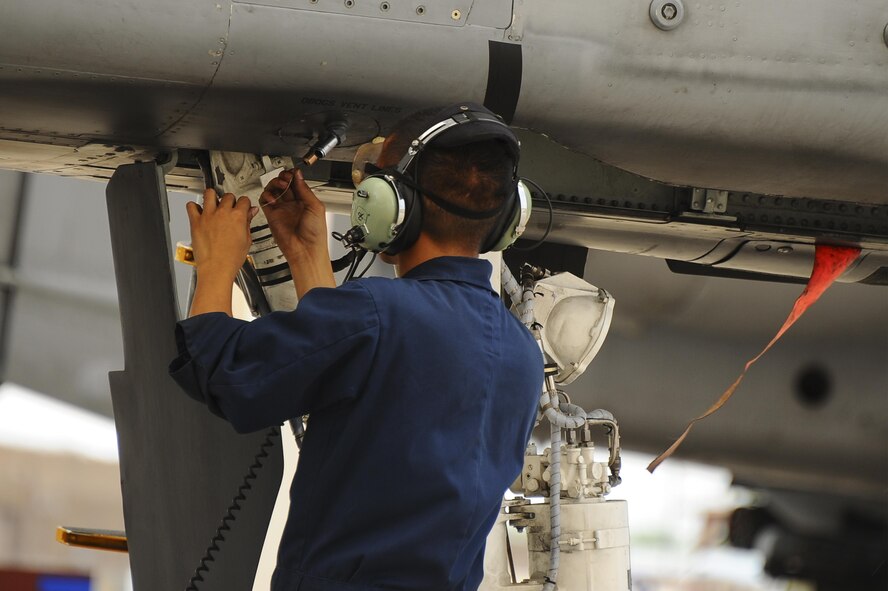 U.S. Air Force Senior Airman Andy Bui, 355th Aircraft Maintenance Squadron A-10C Thunderbolt II crew chief, performs an operational check on the flightline at Davis-Monthan Air Force Base, Ariz., June 23, 2016. The checklists are designed to ensure the safety of the aircraft and the pilot before takeoff. (U.S. Air Force photo by Airman 1st Class Mya M. Crosby/Released)