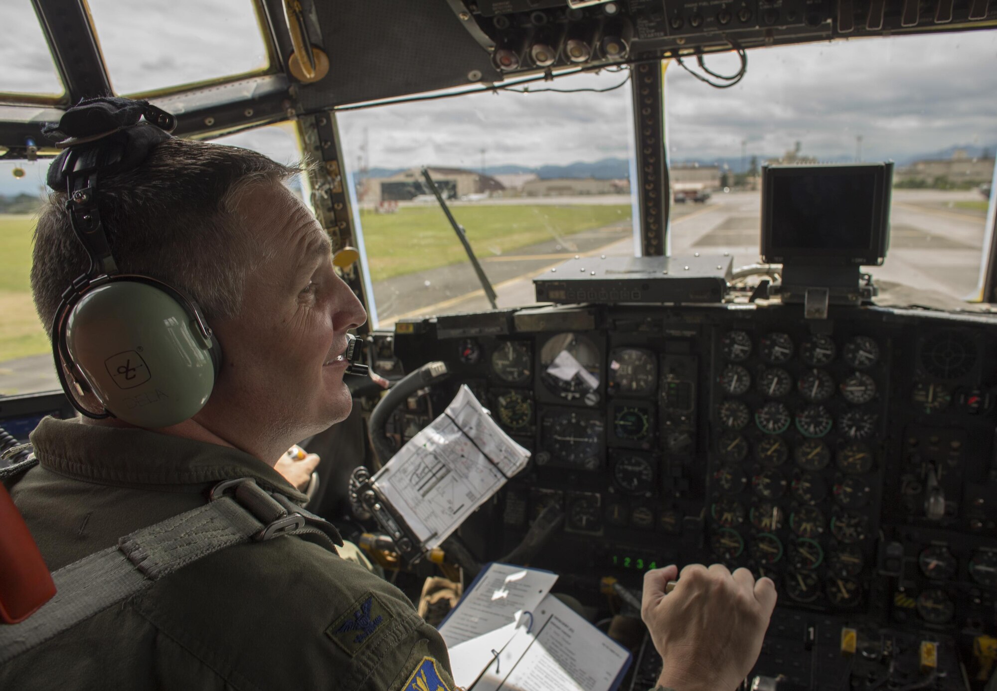 Col. Douglas DeLaMater, 374th Airlift Wing commander, plays with his daughter, Danica, after his final flight at Yokota Air Base, Japan, June 14, 2016. After 24 years of service, including 2,500 flight hours, DeLaMater is preparing to retire and spend more time with his family. (U.S. Air Force photo by Airman 1st Class Elizabeth Baker/Released)