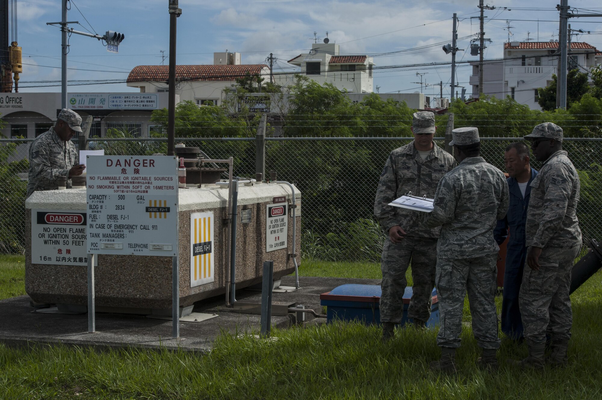 Airmen assigned to the 18th Wing conduct an organizational tank inspection June 21, 2016, at Kadena Air Base, Japan. The inspection was of two convault tanks that are maintained by the 18th Civil Engineer Squadron water fuel system maintenance (WFSM) team. After the inspection was completed, the 18th CES WFSM team was informed of any issues that needed to be resolved. (U.S. Air Force photo by Airman 1st Class Lynette M. Rolen)