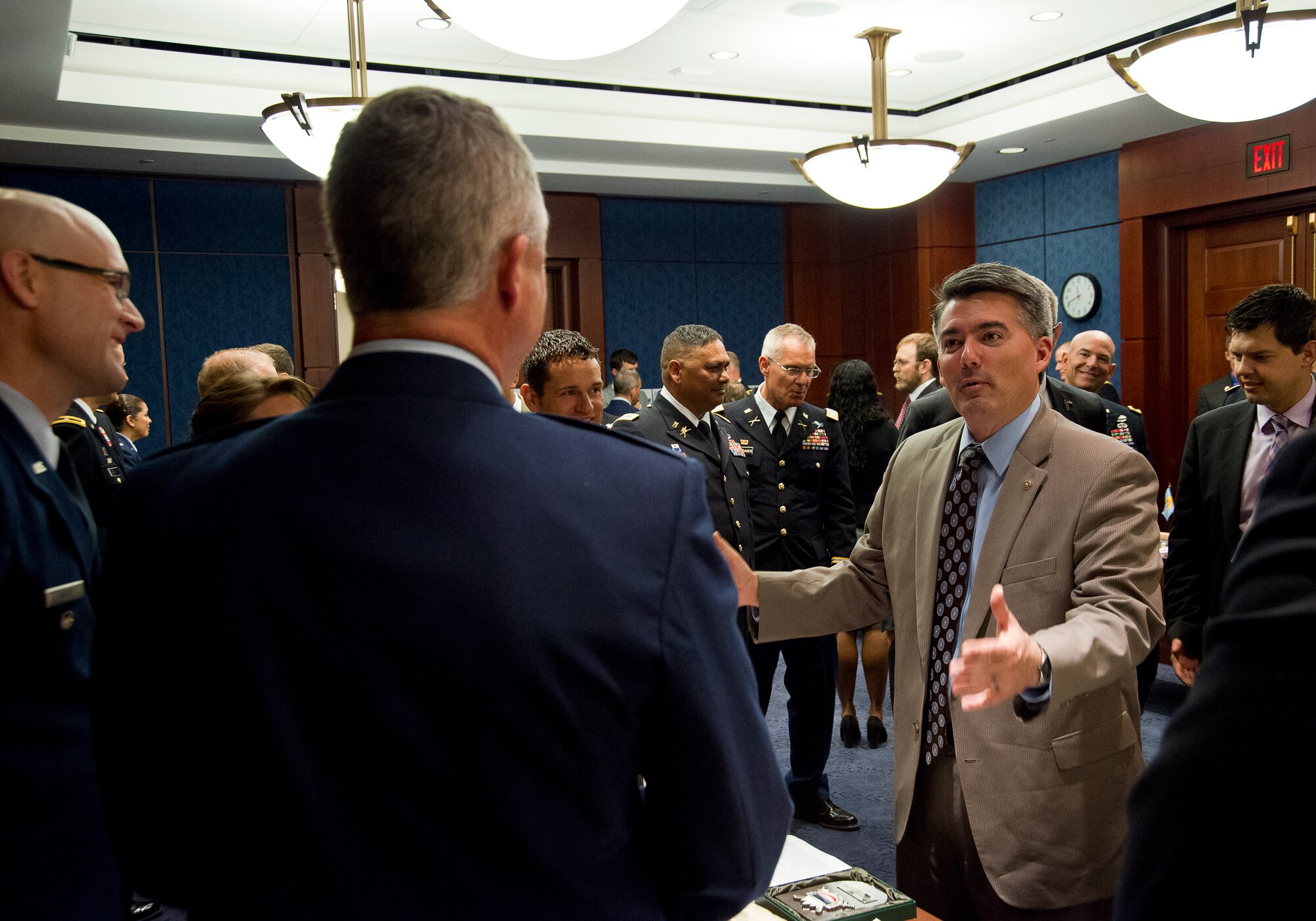 The Hon. Cory Gardner, U.S. Senator from Colorado, speaks with Soldiers and Airmen of the Colorado National Guard about their recent successes with the National Guard Bureau's State Partnership Program at an informational event held at the U.S. Capitol June 16, 2016. Delegations from 19 different states and territories were Washington D.C. to build awareness and understanding of the SPP among Congress and Congressional staff members. (U.S. Air National Guard photo by Staff Sgt. John E. Hillier/released)