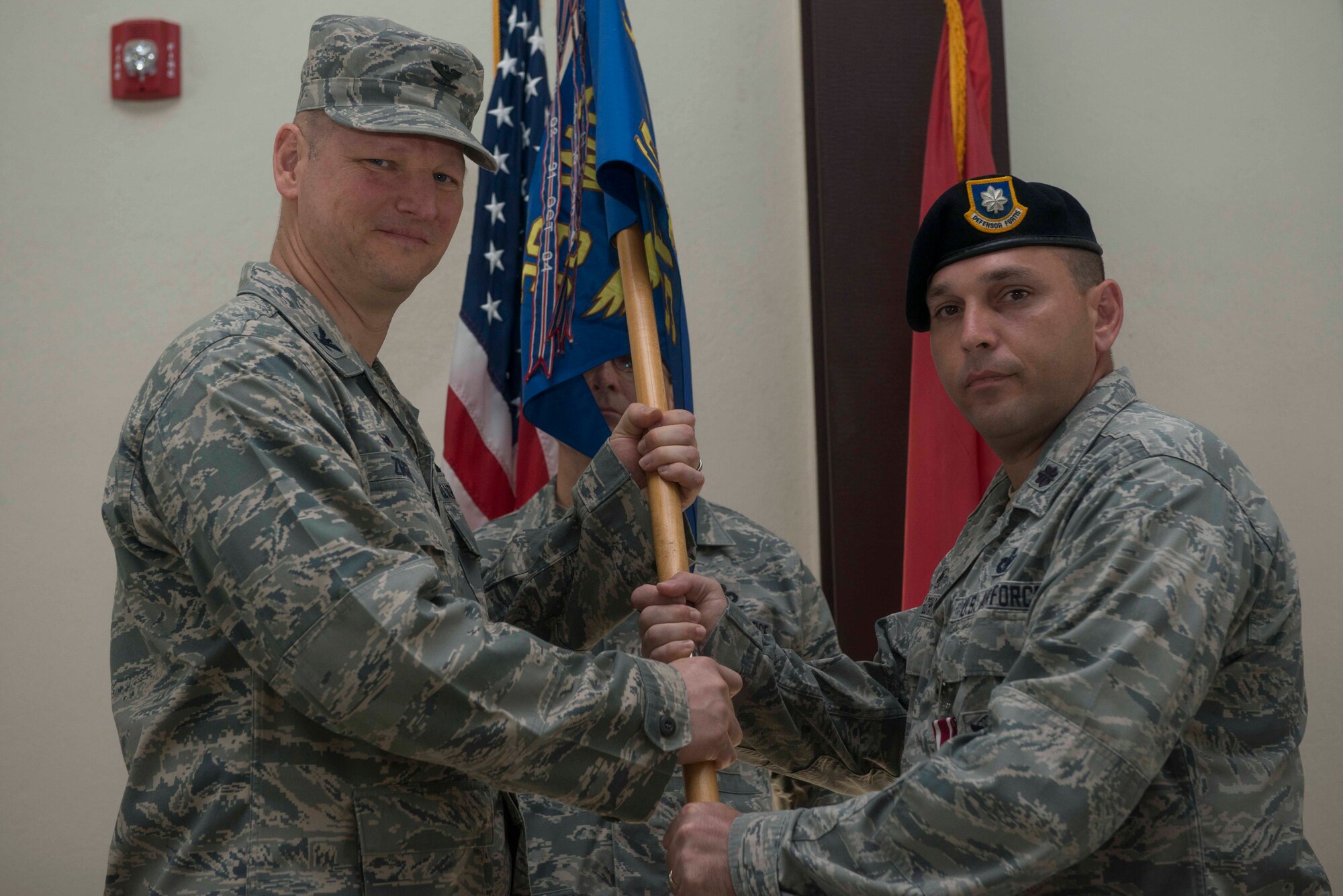 U.S. Air Force Lt. Col. Joseph Mussachia, 39th Security Forces Squadron outgoing commander, relinquishes command to U.S. Air Force Col. James, Zirkel, 39th Weapons System Security Group commander, June 24, 2016, at Incirlik Air Base, Turkey. While the 39th SFS commander, Mussachia was responsible for organizing, training and equipping more than 280 personnel. (U.S. Air Force photo by Senior Airman John Nieves Camacho/Released)