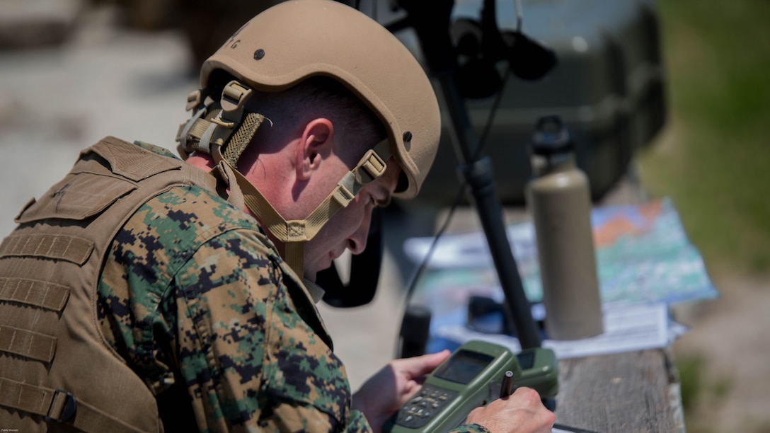 A Marine student with the Tactical Air Control Party course plots coordinates of enemy targets during a two-day live-fire exercise at Marine Corps Base Camp Lejeune, N.C., June 20-21, 2016. The exercise, which was the culminating event of the five-week TACP course conducted by Expeditionary Warfare Training Group-Atlantic, certifies Marines in the ability to employ the air-controlled weapons systems on both fixed and rotor-wing aircrafts.