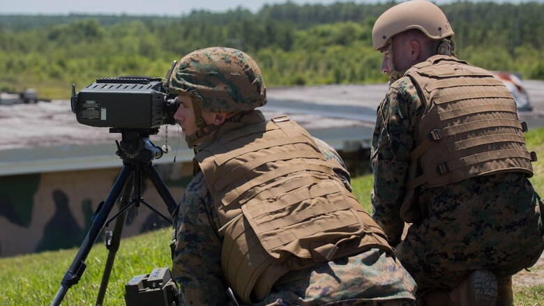 Marine students with the Tactical Air Control Party course, conducted by Expeditionary Warfare Training Group-Atlantic, work together to call in air-support where friendly forces are being suppressed by the enemy during a two-day live fire exercise at Marine Corps Base Camp Lejeune, N.C., June 20-21, 2016. Air officers must be TACP certified to effectively employ air assets in the event that ground troops need close air support.
