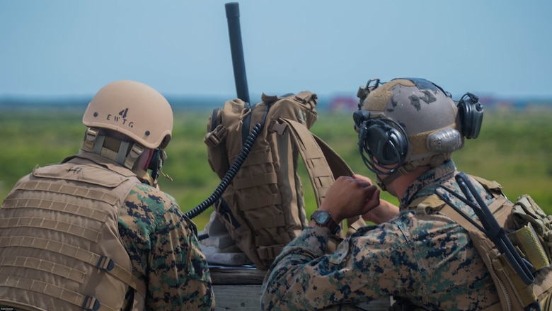 Marine students with the Tactical Air Control Party coursework together to call in air-support where friendly forces are being suppressed by the enemy during a two-day live-fire exercise at Marine Corps Base Camp Lejeune, N.C., June 20-21, 2016. The exercise, which was the culminating event of the five-week TACP course conducted by Expeditionary Warfare Training Group-Atlantic, certifies Marines in the ability to employ the air-controlled weapons systems on both fixed and rotor-wing aircrafts.