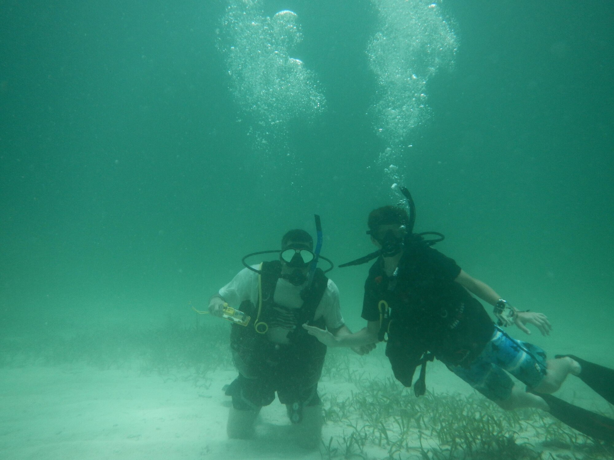 Airmen from Homestead Air Reserve Base scuba dive during a Recharge for Resiliency event where they learned this skill at Islamorada Dive Center in Tavernier, Fla., June 18. RFR programs give Airmen the opportunity to enjoy recreational actives at a nominal fee.(Courtesy Photo)