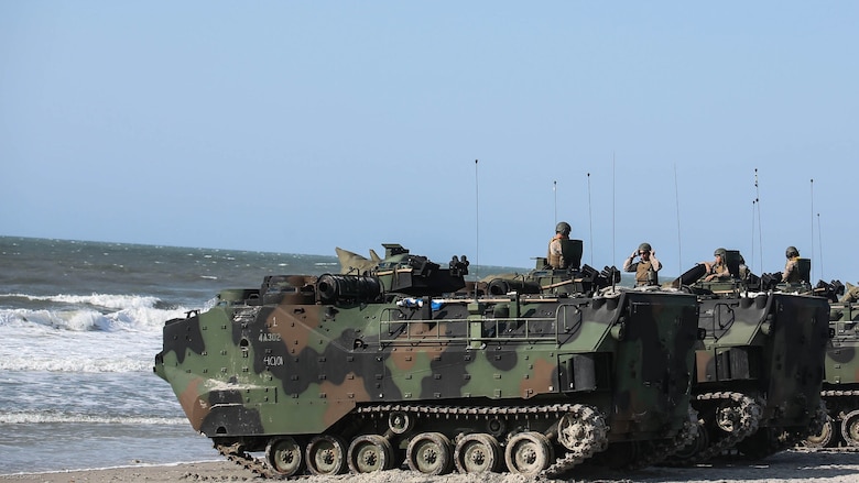 Marines with Charlie Company, 4th Assault Amphibian Battalion prepare for amphibious operations at Marine Corps Base Camp Lejeune, N.C., June 22, 2016. The company, based in Galveston, Texas, conducted operations in land and sea to prepare for their upcoming unit deployment program to Okinawa. 