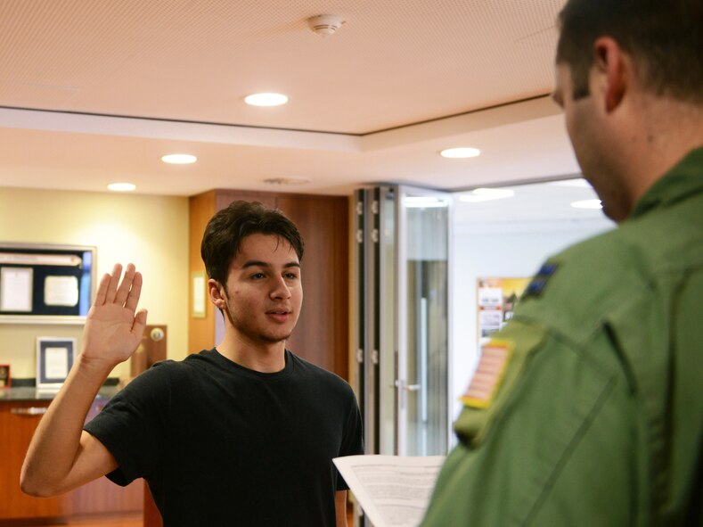 Michael Jimenez takes his oath of enlistment at Ramstein Air Base, Germany, June 22, 2016. The Ramstein recruitment office services U.S. citizens in the European and African areas of responsibility. (U.S. Air Force photo/ Airman 1st Class Joshua Magbanua)