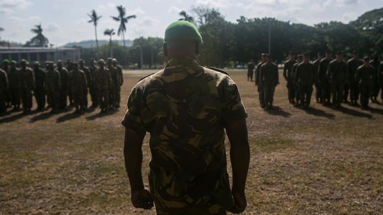 U.S. Marines and Sailors, with Task Force Koa Moana, join ranks with Papua New Guinea soldiers during the opening ceremony for Exercise Koa Moana, June 18, 2016, at Taurama Barracks, Papua New Guinea. The multi-national, bilateral exercise is designed to improve interoperability and relations by sharing infantry, engineering, medical and law enforcement skills.