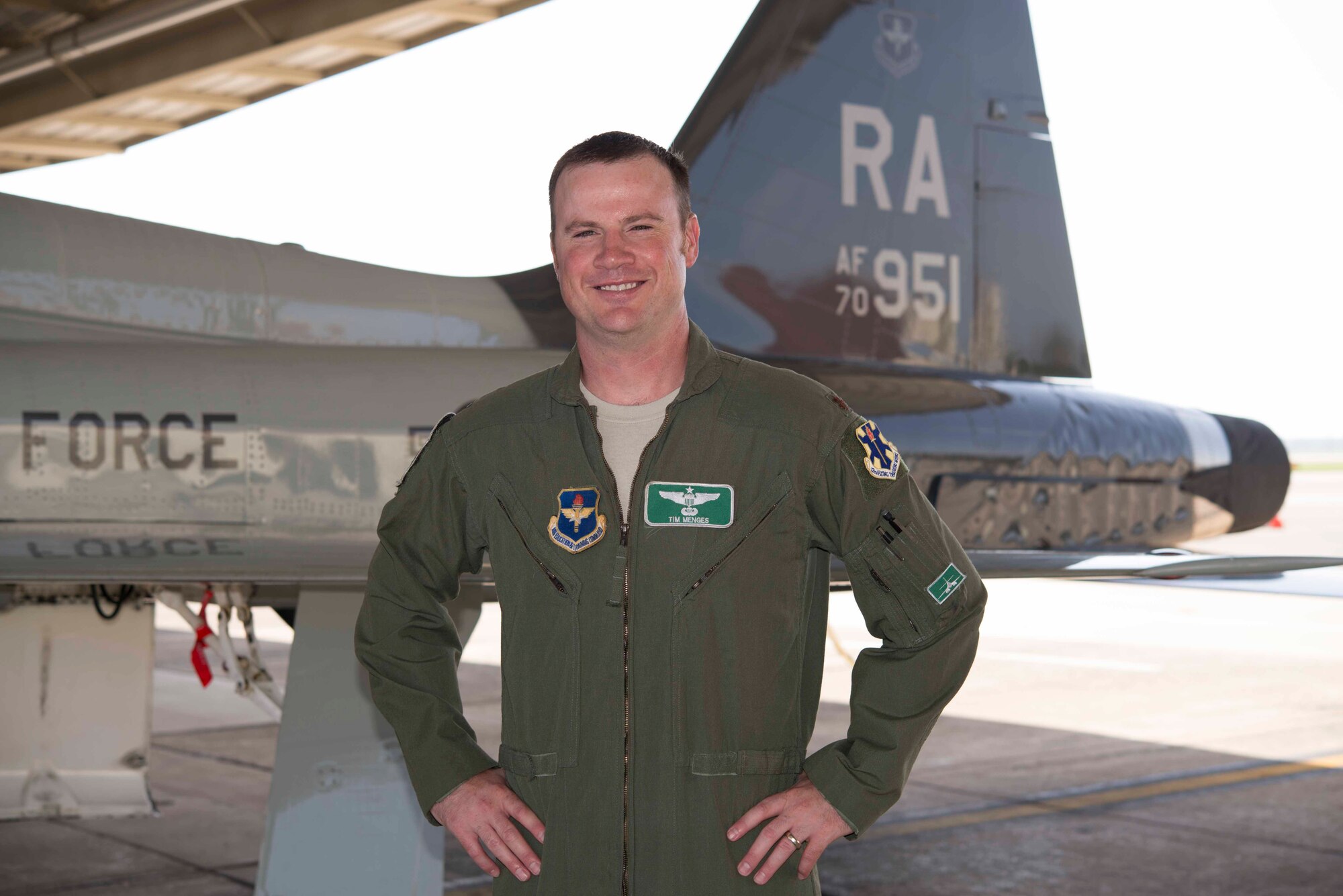 Maj. Tim Menges, a 560th Flying Training Squadron Instructor Pilot poses for a photo in front of a T-38C Talon at Joint Base San Antonio-Randolph, Texas. Menges landed his T-38C Talon at Victoria Regional Airport Jan. 25, 2016, following a bird air strike that knocked out the jet's electrical power during a training mission.  (U.S. Air Force photo by Randy Martin)