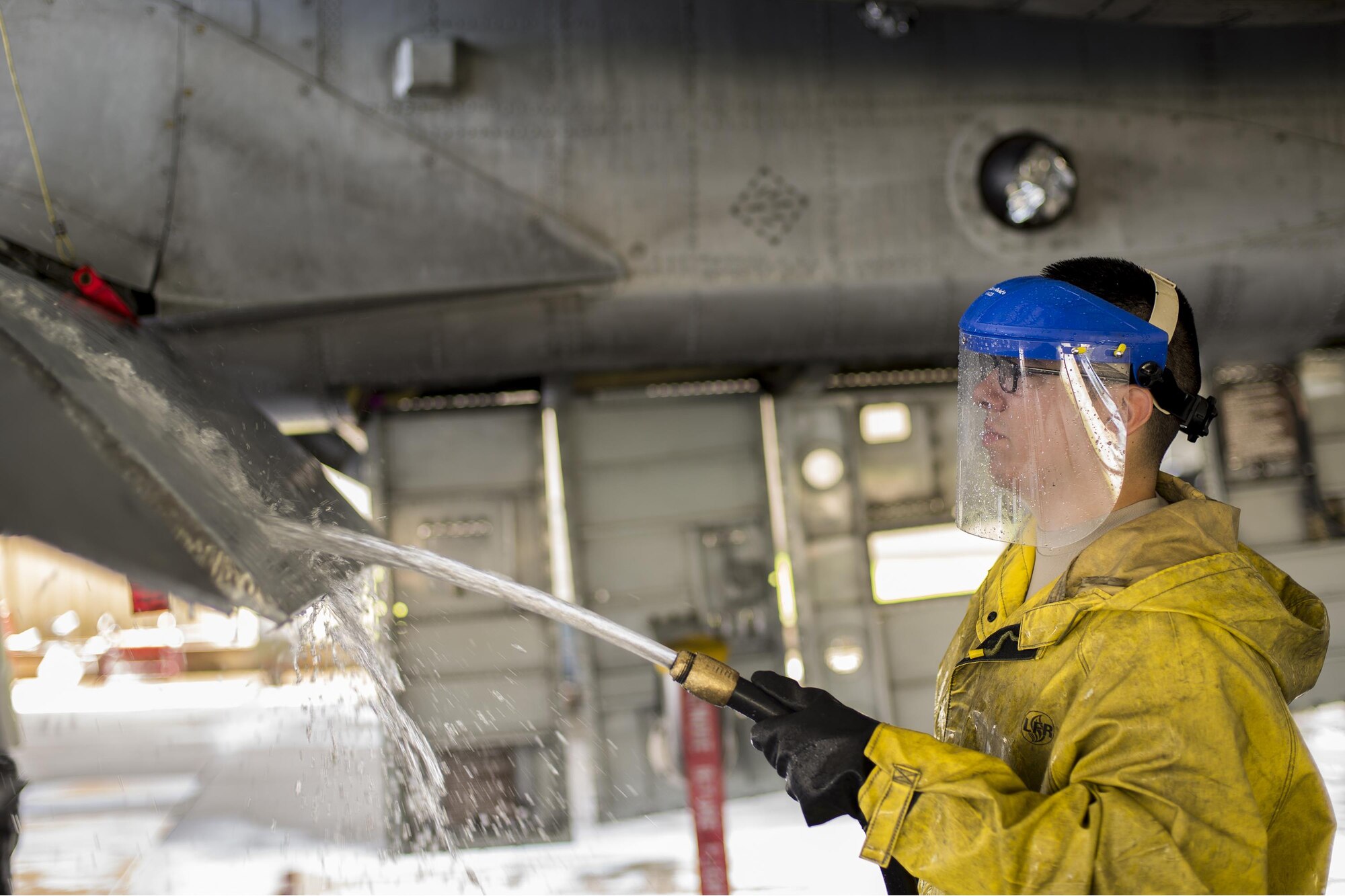 U.S. Air Force Airman 1st Class Alan Oseguera, 23d Aircraft Maintenance Squadron weapons technician, rinses the wing of an A-10C Thunderbolt II, June 16, 2016, at Moody Air Force Base, Ga. Washing an A-10 can take anywhere between four and eight hours depending on how many Airmen are involved. (U.S. Air Force photo by Airman Daniel Snider/Released)