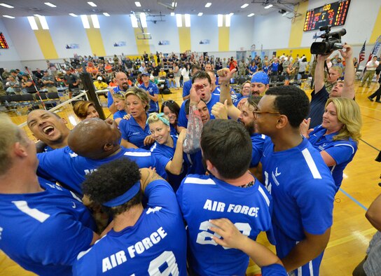 Secretary of the Air Force Deborah Lee James celebrates with the Air Force wounded warrior sitting volleyball team after their gold medal victory at the 2016 Department of Defense Warrior Games at the U.S. Military Academy in West Point, N.Y., June 21, 2016. The Warrior Games took place from June 15-21, and is an adaptive sports competition for wounded, ill and injured service members and veterans. (U.S. Air Force photo/Staff Sgt. Carlin Leslie)