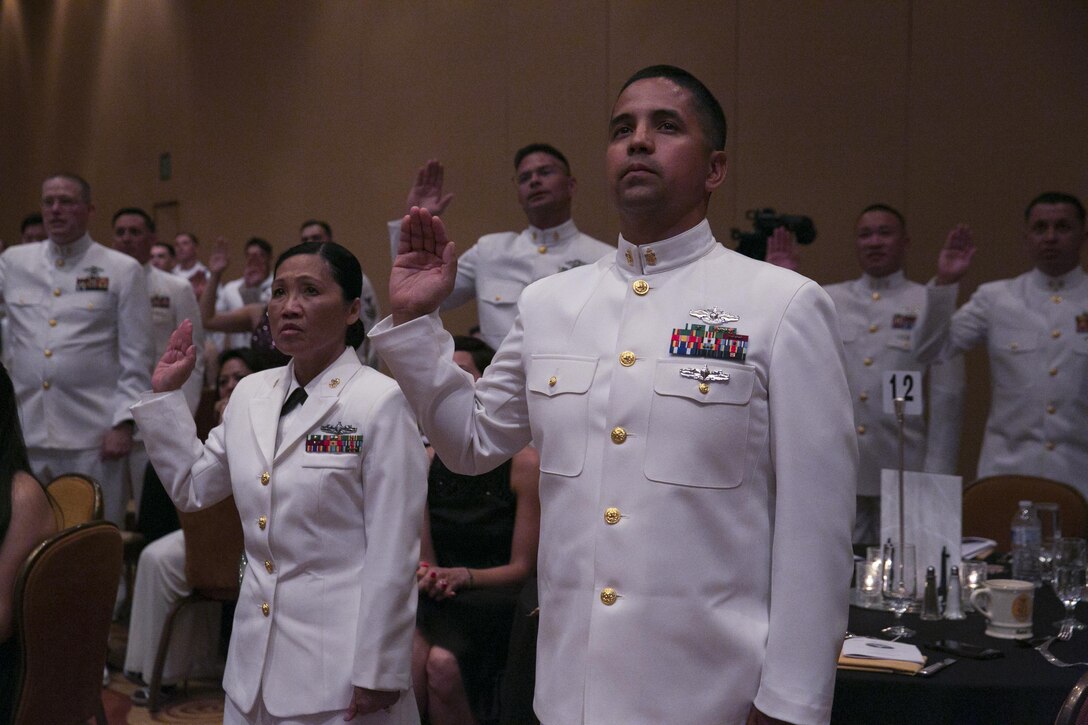 Corpsmen recite the hospital corpsman pledge during the 118th Hospital Corpsman Ball at Pechanga Resort and Casino in Temecula Calif., June 17, 2016. Corpsmen recite the pledge every year to remember the dedication they have to caring for fellow service members. (Official Marine Corps photo by Lance Cpl. Dave Flores/Released)