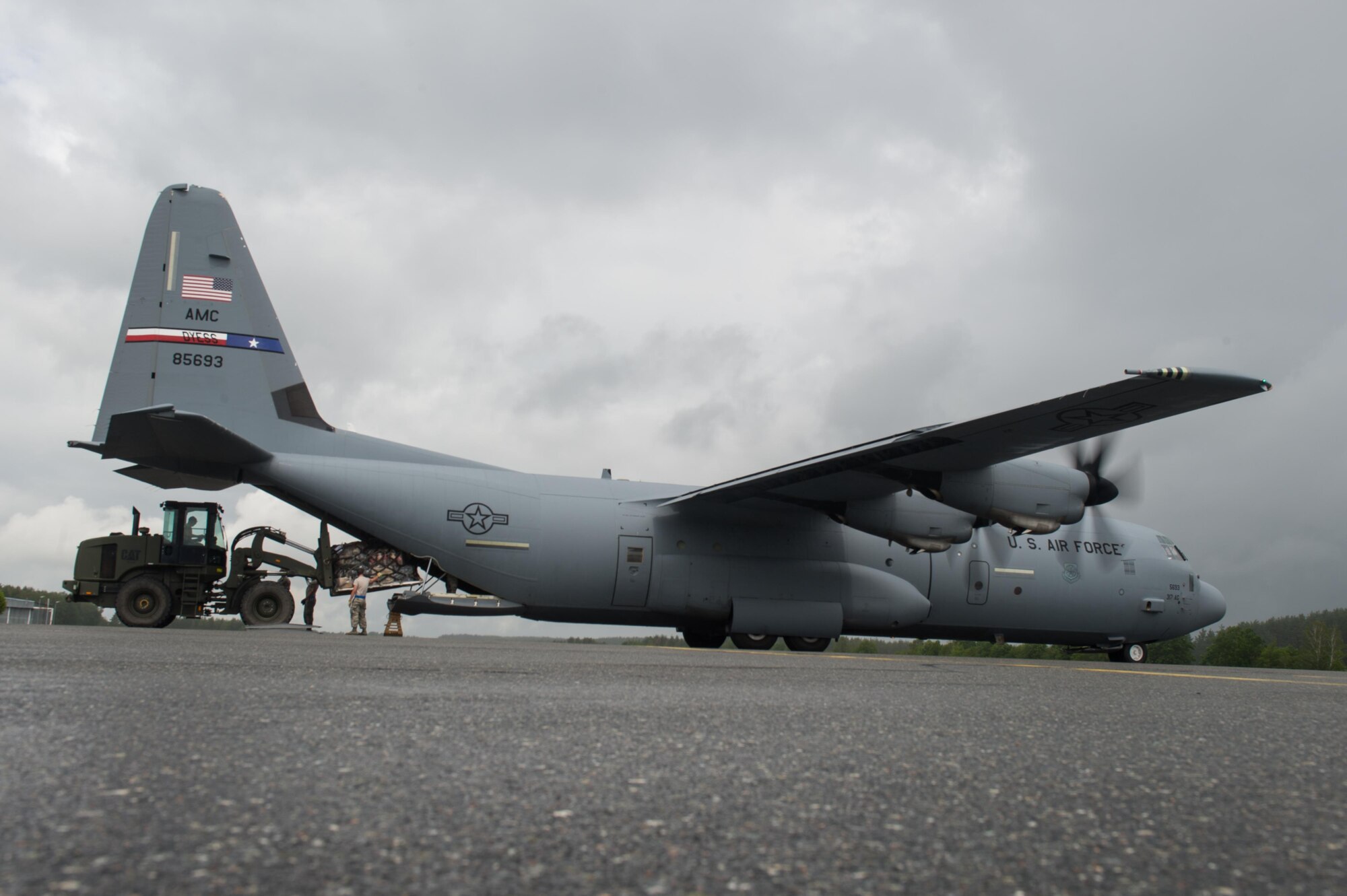 A U.S. Air Force C-130J Super Hercules from Dyess Air Force Base, Texas, delivers equipment for an airfield assessment team from the 821st Contingency Response Group during Exercise Swift Response 16 at Grafenwoehr, Germany, June 14, 2016. Exercise SR16 is one of the premier military crisis response training events for multinational airborne forces in the world, the exercise has more than 5,000 participants from 10 NATO nations. (U.S. Air Force photo by Master Sgt. Joseph Swafford/Released) 