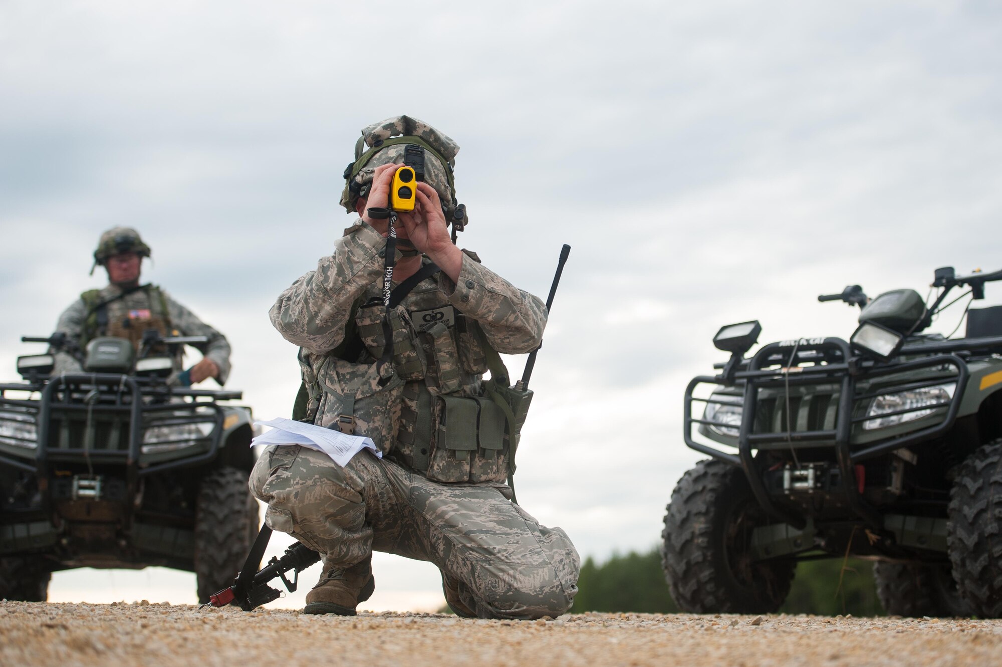 U.S. Air Force Staff Sgt. Andrew Meyer, 921st Contingency Response Squadron airfield manager conducts an airfield assessment during Exercise Swift Response 16 at Hohenfels Training Area, Germany, June 16, 2016. Exercise SR16 is one of the premier military crisis response training events for multinational airborne forces in the world, the exercise has more than 5,000 participants from 10 NATO nations. (U.S. Air Force photo by Master Sgt. Joseph Swafford/Released) 
